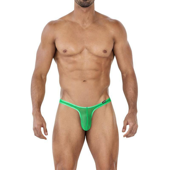 C4MSPX11 Micro Thong Green on male model showcasing minimalist T-back design.
