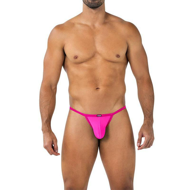 Model wearing C4MSPX16 Tanga Kini Hot Pink, a men's thong designed for comfort and style in bold, vibrant color.