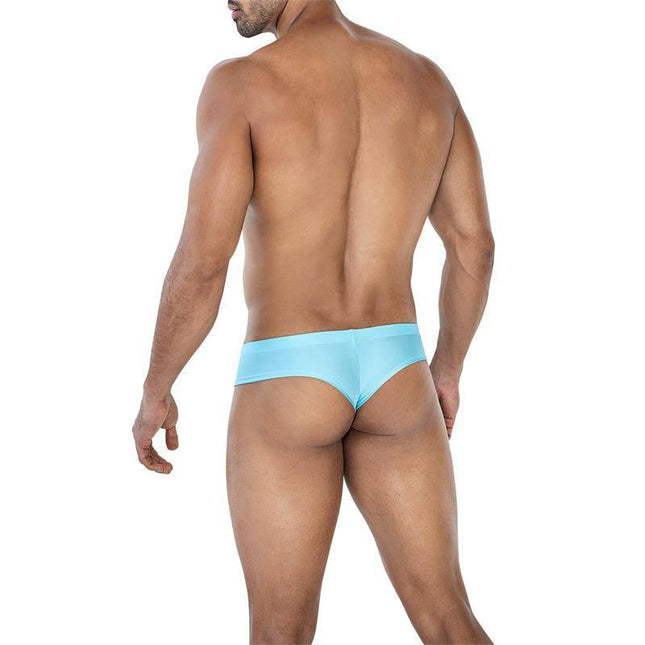 C4MSPX22 Hybryd Cheeky Brief Aqua shown on male model, showcasing vibrant aqua color and cheeky design, ideal for pool or beach wear.