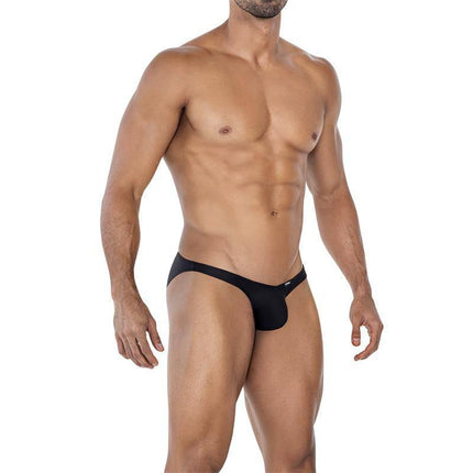 Model wearing C4MSPXBUL01 Low Rise Bulge Brief Black, showcasing a sleek design and comfortable fit from the CUT4MEN collection.