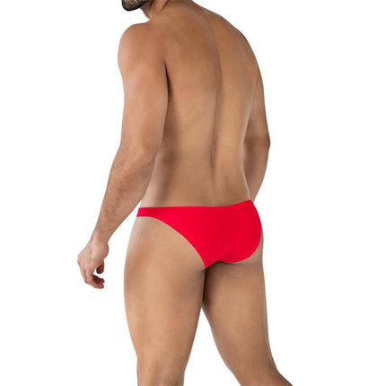 Back view of model wearing C4MSPXBUL01 Low Rise Bulge Brief Scarlet, highlighting the slim, low-rise silhouette and fuller rear coverage in scarlet color