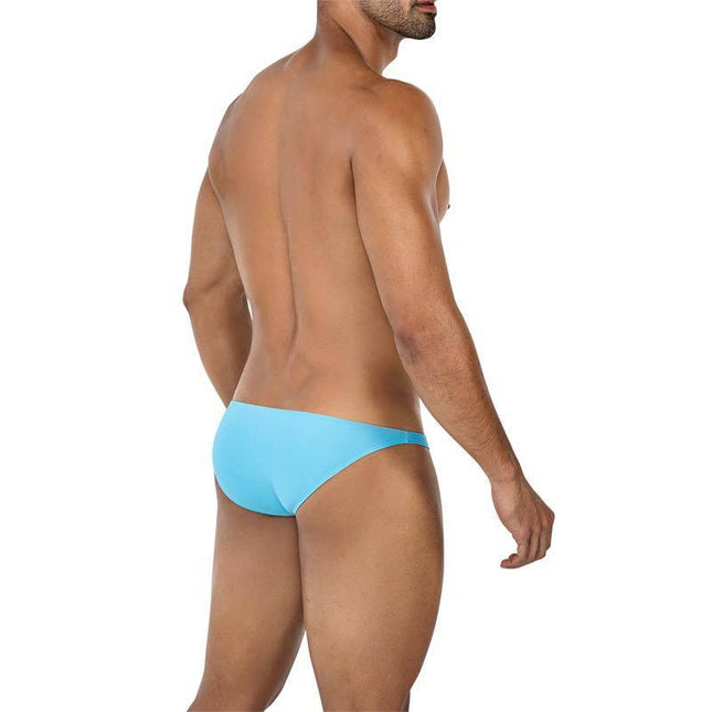 Man wearing C4MSPXBUL01 Low Rise Bulge Brief Turquoise from CUT4MEN collection, showcasing back view of turquoise brief for men.