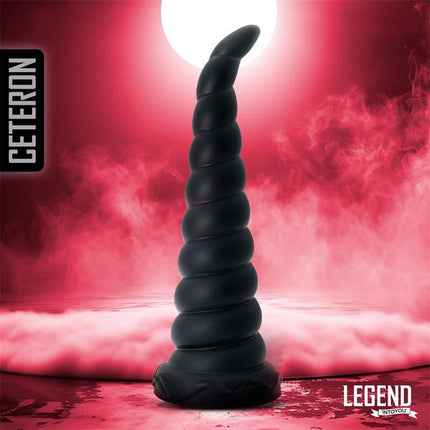 Ceteron Liquid Silicone Dildo 20 cm with zigzag body and pointed tip against a vibrant backdrop.