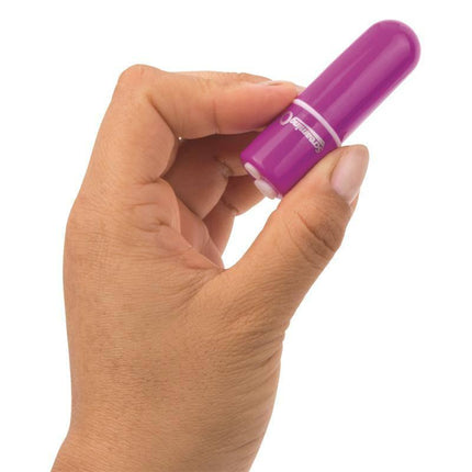 Hand holding Charged Vooom Bullet Vibe - Purple, a compact waterproof vibrator with 10 vibration functions.