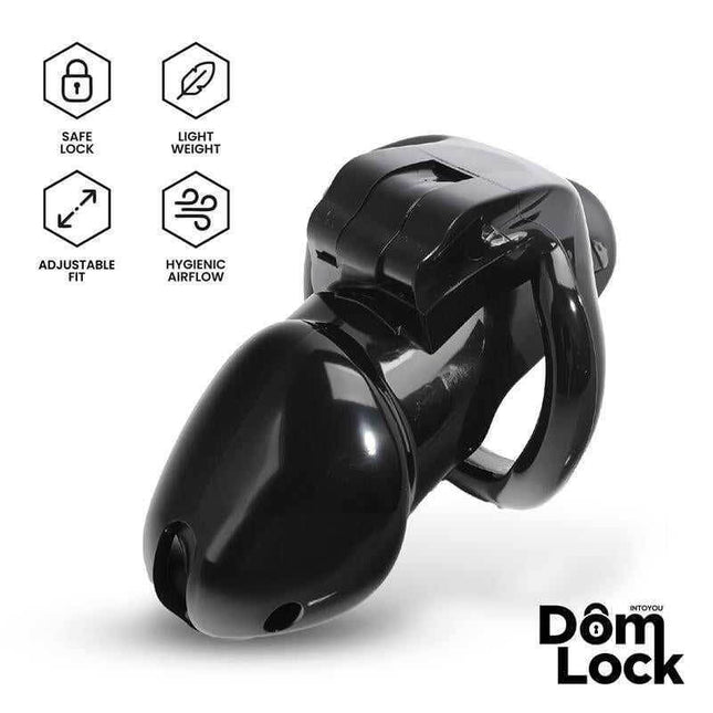 Black Domlock chastity cage with internal lock for domination, featuring safe lock, lightweight design, adjustable fit, hygienic airflow.