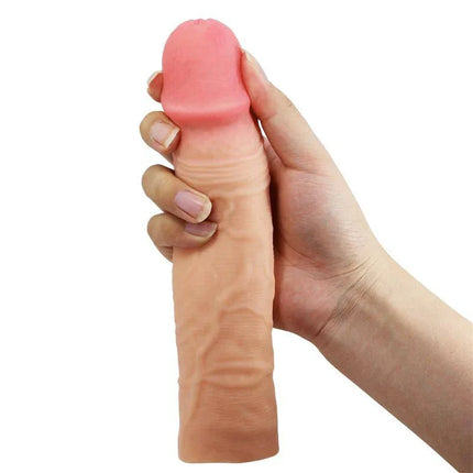 Hand holding Chelsea Penis Extended Sleeve showcasing realistic design and lifelike details for enhanced sensation and erection extension.