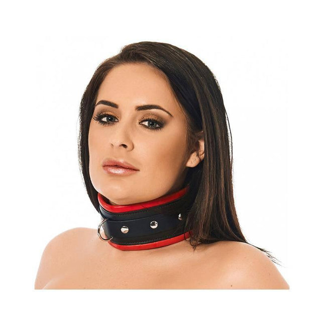 Model wearing Collar LUX, a black leather collar with red accents, adjustable metal buckle, 7 cm width, perfect for daring play and comfort.