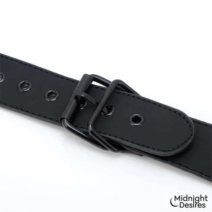 Close-up of vegan leather buckle in Collar and Wrist Cuffs Body Restraint Set by Midnight Desires