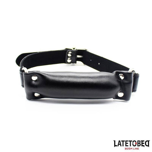 Comfortable Adjustable Gag Pillow in black, lightweight design for user comfort and control, BDSM accessory.