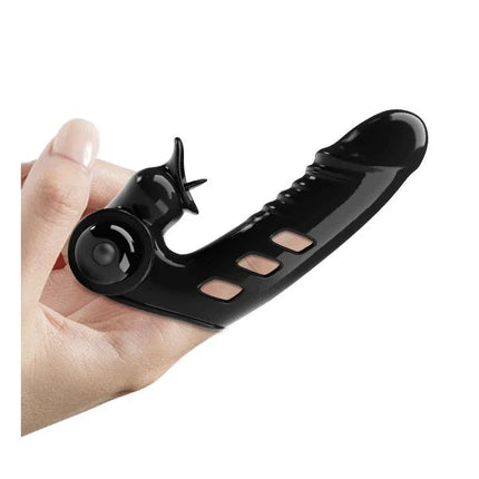 Hand holding the Corbin Finger Sleeve with Vibration, a black fingertip-friendly stimulator designed for precise pleasure and easy control.