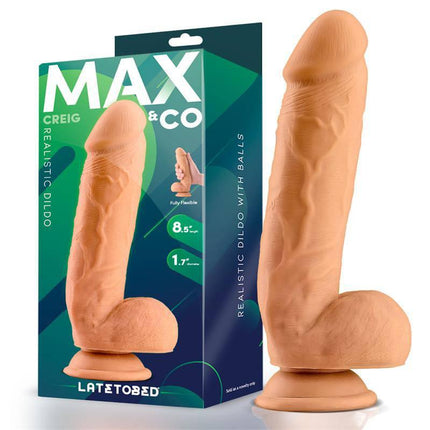 Creig Realistic Dildo with Testicles 8.5 Flesh in packaging, showcasing lifelike details and design for authentic pleasure.