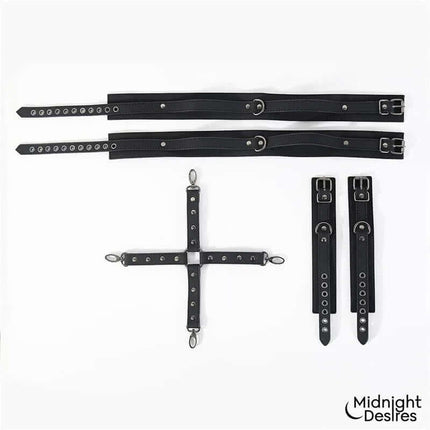 Cuffs and Thigh Hogtie Set by Midnight Desires featuring adjustable wrist and thigh cuffs with detachable cross restraints for bondage play.