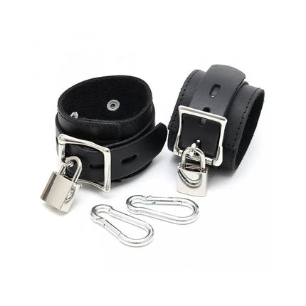 Black leather cuffs with padlocks-adjustable, featuring buckles and metal clips for secure restraint, designed for quality and versatility.