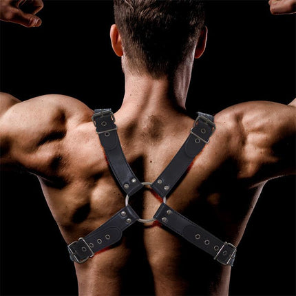 Darom Male Chest Bondage Harness Vegan Leather on male model, showing adjustable straps and O-ring, viewed from the back.