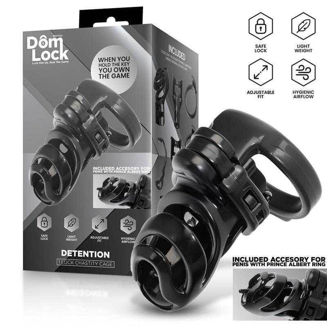 Detention Chastity Cage for Prince Albert Piercing by Domlock with packaging and accessories for pleasure and submission.