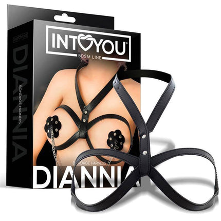 Diannia Bondage Breast Harness displayed with packaging, featuring adjustable straps for a bold and empowering statement piece.