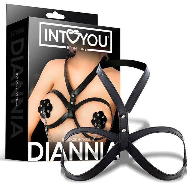 Diannia Bondage Breast Harness displayed with packaging, featuring adjustable straps for a bold and empowering statement piece.