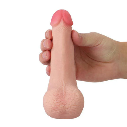 Hand holding Dildo Limpy 100% Flexible 5 Flesh with realistic design and lifelike details for all-day comfort and discreet use.