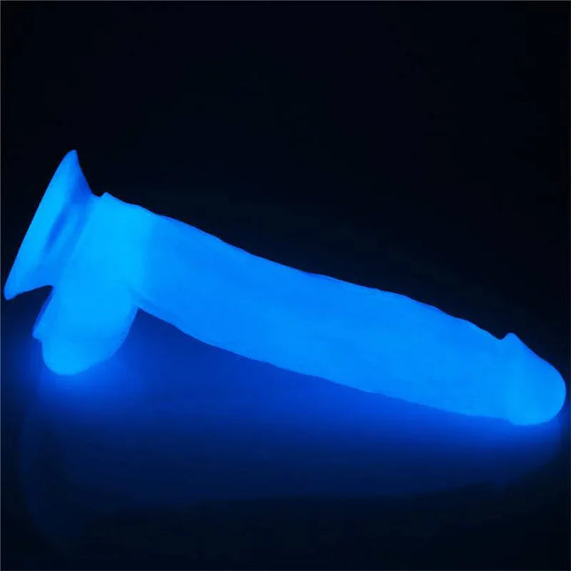 Dildo Lumino 10 Blue Light glowing in the dark, showcasing its vibrant blue hue for enhanced intimate experiences.