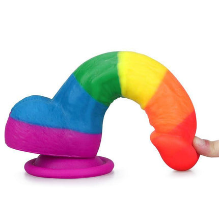 Dildo Prider 8 Liquid Silicone LGBT with vibrant Pride flag colors, ergonomic curved design, and suction base for pleasure and comfort.