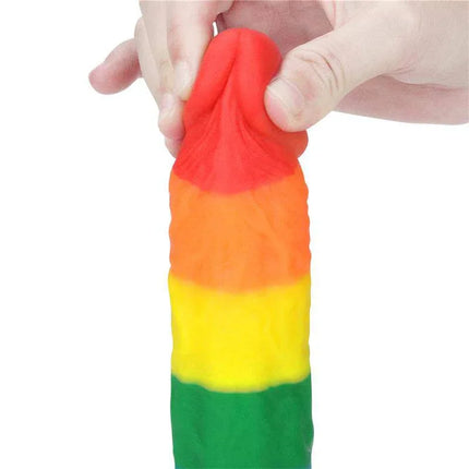 Dildo Prider 8 Liquid Silicone LGBT with colorful Pride flag design, held in hand, showcasing vibrant, body-safe silicone material.