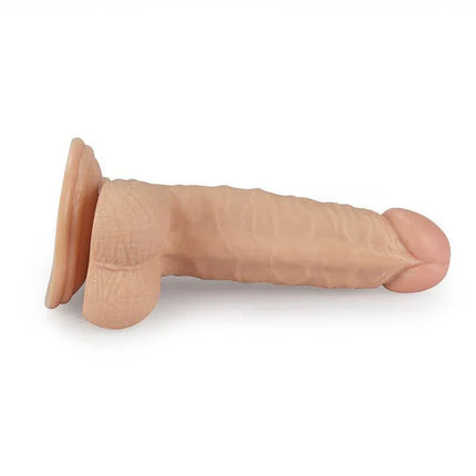 Dildo Real Extreme 7 Flesh with lifelike veins and testicles, offering realistic texture and versatile use.
