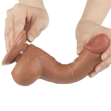 Hands holding the flexible Dildo Sliding Skin 7.5 Brown with lifelike texture and dual-layer TPE material for adult pleasure.