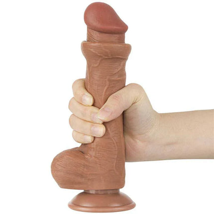 Dildo Sliding Skin 8 Brown with lifelike dual-layer design and flexible shaping, held in hand, featuring soft outer and firm inner core.