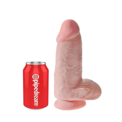 Dildo with Ball Chubby 9 next to a soda can for size comparison, highlighting realistic texture and detail.