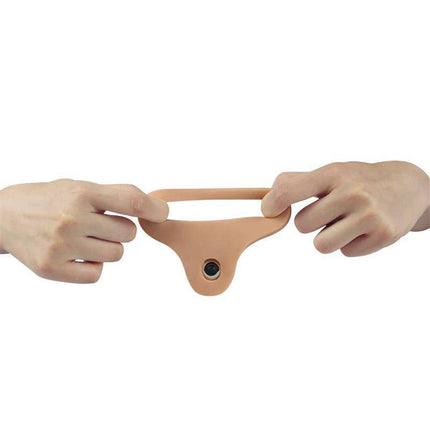 Hands holding the strap of the Dildo with Vibration 7, showcasing its secure fit and versatile play feature