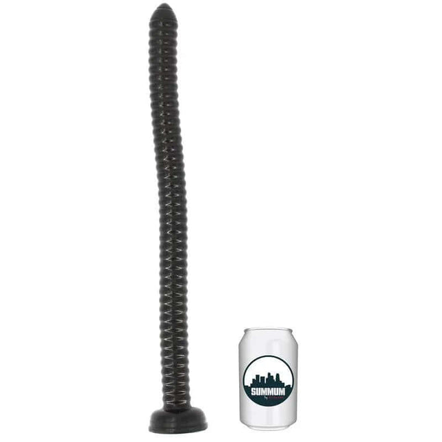 Dildo Savana 46 cm next to a soda can for size comparison, featuring a textured, flexible shaft designed for enhanced anal stimulation.