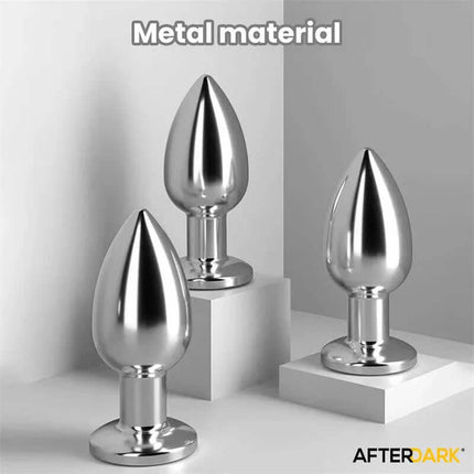 Dimpor Chrome Anal Plug with Vibration and Magnetic USB Size S, premium metal anal toys displayed on pedestals