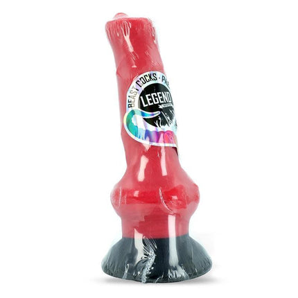 Vibrant red silicone dildo, beast design, with black base, wrapped in protective film.