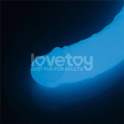 Double dildo Lumino Blue Light 18.5 glowing under low light for versatile pleasure.