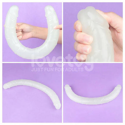 Double dildo Lumino Blue Light 18.5 glow-in-the-dark design with dual-ended features for versatile stimulation on purple background