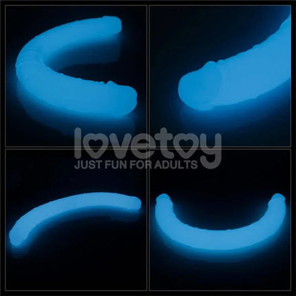 Glow-in-the-dark Double dildo Lumino Blue Light 18.5 with dual-ended design for versatile pleasure in low light.