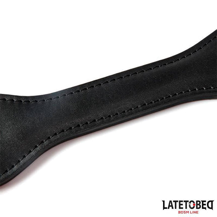 Close-up of Double Layers Paddle LOVE 32 cm from Latetobed BDSM Line, featuring durable black PU construction with stitching details.