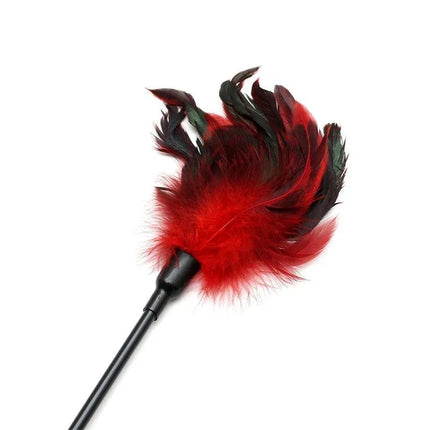 Double Pleasure Whip with red feather stimulator, ideal for sensory play, featuring dual-sided design including feather and paddle ends.