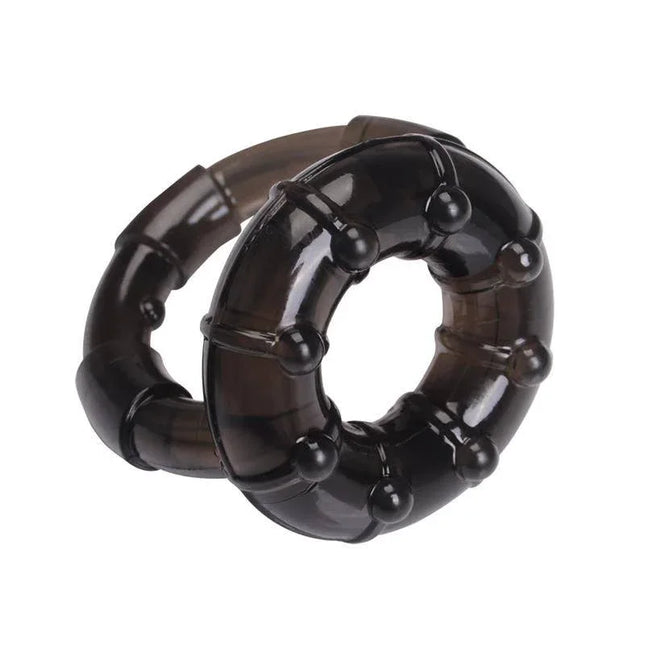 Dual Enhancement Ring - black dual-ring set made of phthalate-free TPE for enhanced sensations and control in intimate moments.