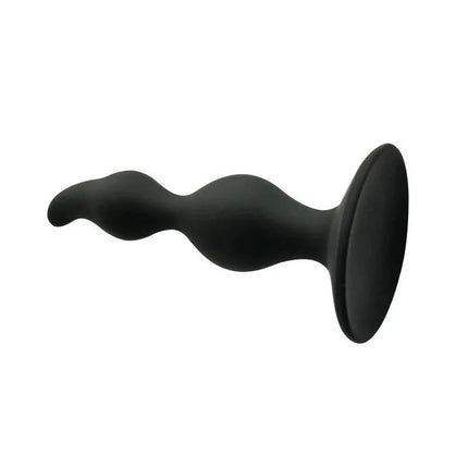 Black Dylamic Butt Plug Silicone 11 cm x 3 cm with curved tip and base for safe and comfortable wear.