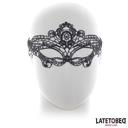 Elegant Mask Black lace design on mannequin, showcasing intricate elegance and versatility for casual, business, or evening wear.