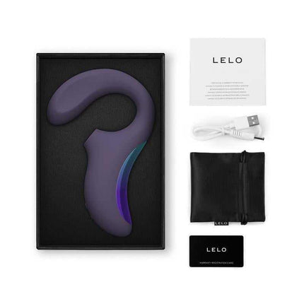 Enigma Wave Clitoris Sucker Purple in box with accessories, showcasing the luxurious design and biocompatible silicone finish.