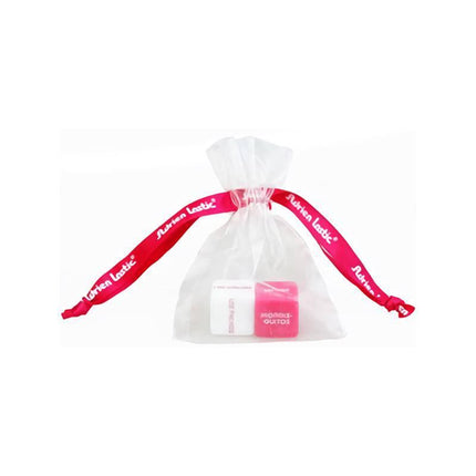 Erotic Dice Deutsch in sheer bag with red ribbon, ideal for couples' playful moments.