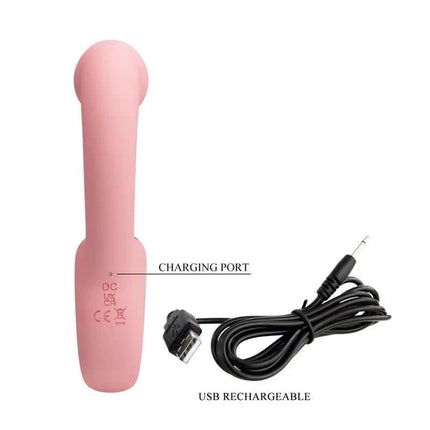 Erynnyes Vibrator with Licking in pink with USB charging cable, featuring smooth design and medical-grade silicone for dual-stimulation.