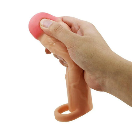Extended Penis Sleeve 2 Hani in hand, showcasing realistic feel and design for enhanced intimacy.