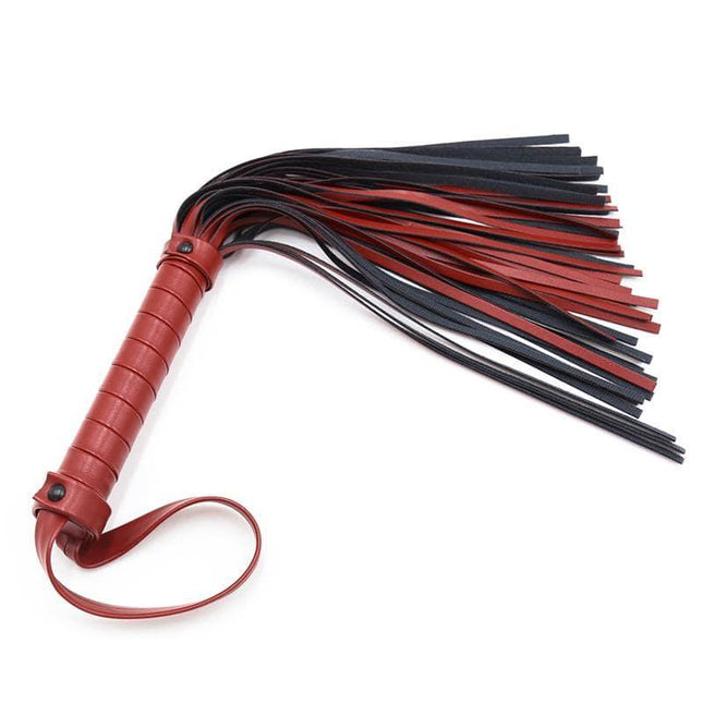 Extra Soft Flogger 40 cm with red and black tassels and textured handle, perfect for refined intimate play and BDSM enthusiasts.