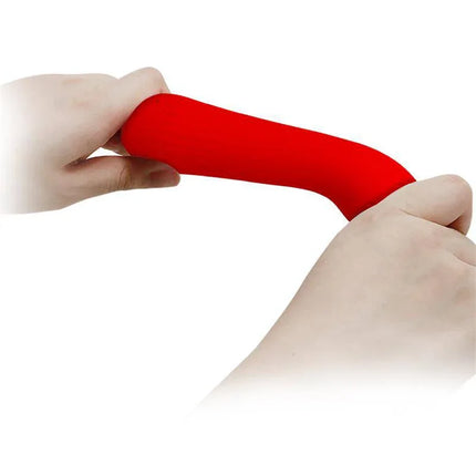 Faun Vibrator Red being held, showcasing its flexible and ergonomic design for G-spot stimulation.