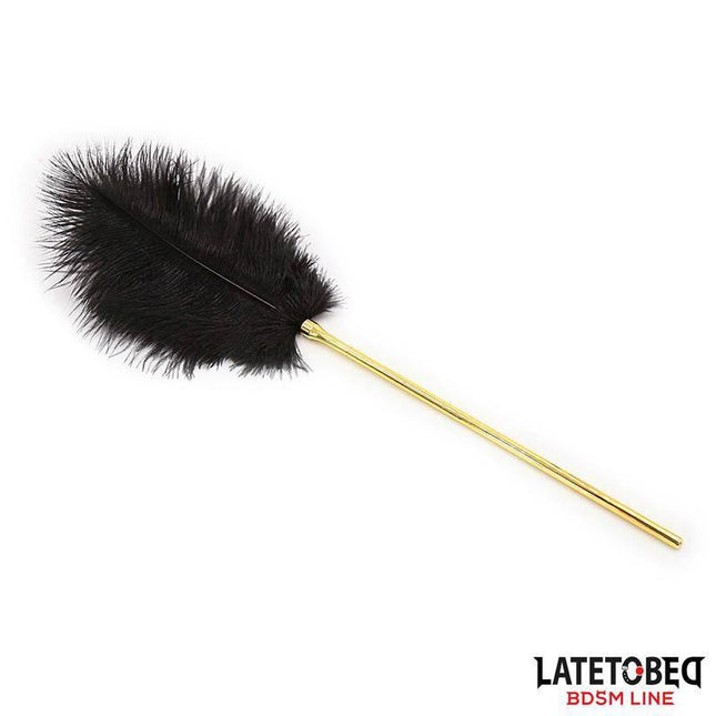 Feather Tickler 41 cm with gold-tone handle, part of Latetobed's BDSM Line for sensory play and heightened arousal. Elegant and lightweight.