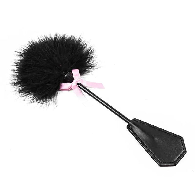 Feather Tickler and Paddle 2 in 1 29 cm Black BDSM toy with dual ends for sensory play and impact, featuring black feathers and leather paddle.