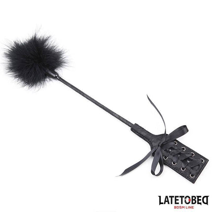 Feather Tickler & Paddle - Intimate Play, black dual-action accessory with ribbon detail for sensual teasing and foreplay, 41 cm length.
